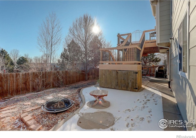 view of patio / terrace featuring an outdoor fire pit