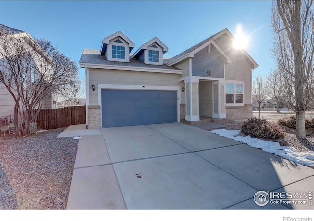 view of front of property with a garage