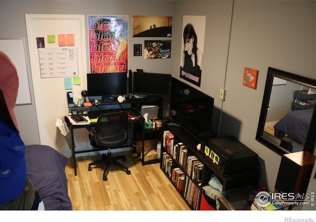 office space with light wood-type flooring