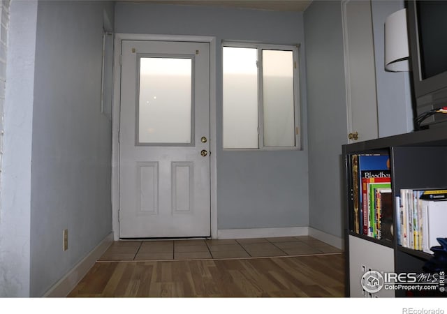 doorway featuring tile patterned floors