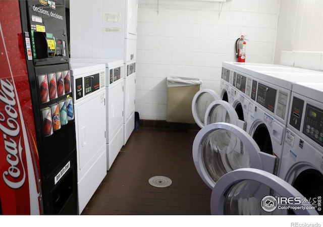 laundry room featuring washing machine and dryer