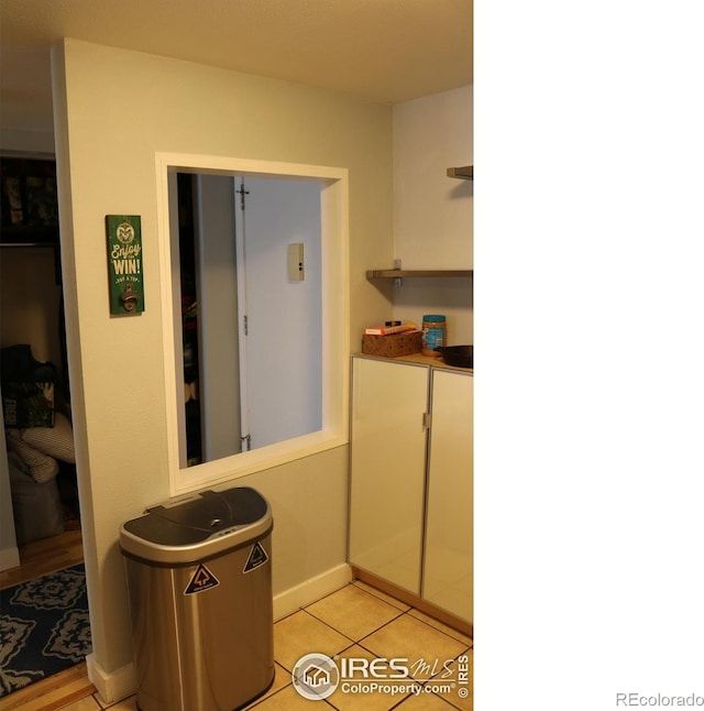 bathroom with tile patterned flooring