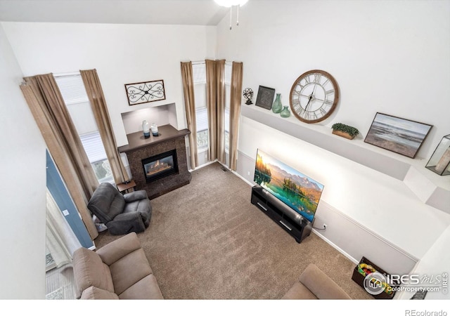 living room with carpet flooring and a healthy amount of sunlight