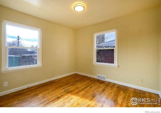 empty room featuring light hardwood / wood-style floors