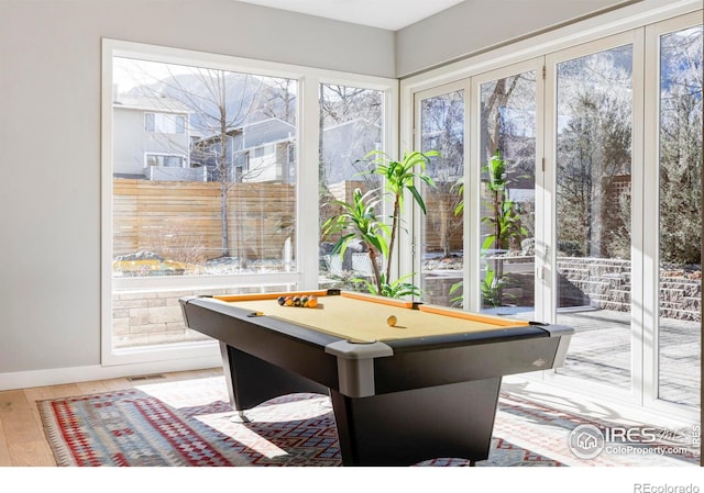 game room featuring wood-type flooring and billiards