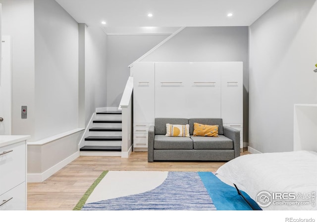 bedroom with light hardwood / wood-style floors