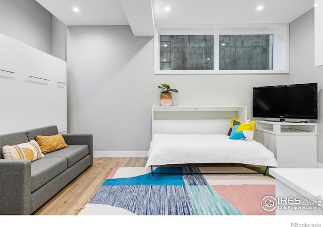 bedroom featuring light hardwood / wood-style floors