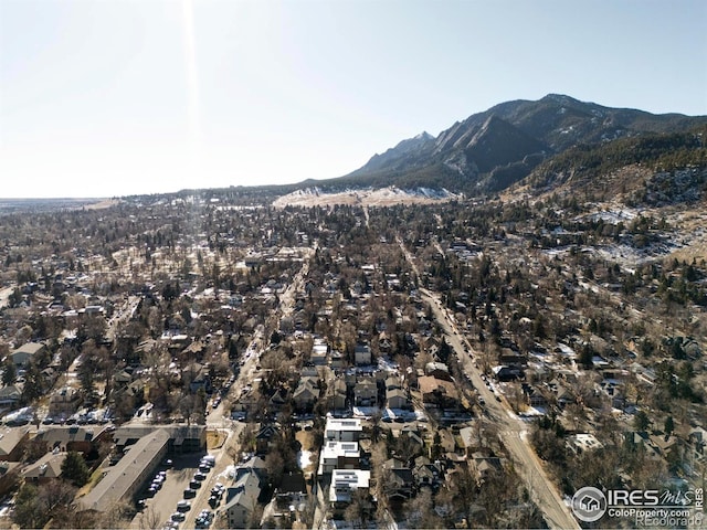 drone / aerial view featuring a mountain view