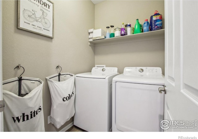 laundry area with washer and clothes dryer