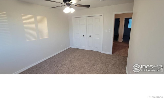 unfurnished bedroom featuring carpet floors, ceiling fan, and a closet