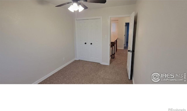 unfurnished bedroom featuring a closet, ceiling fan, and light carpet