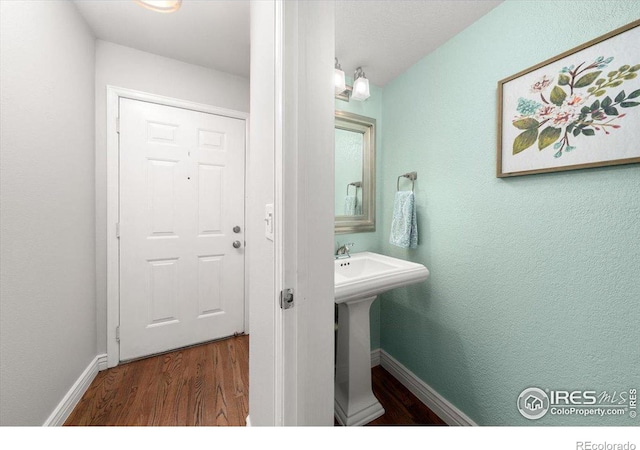 bathroom featuring hardwood / wood-style flooring