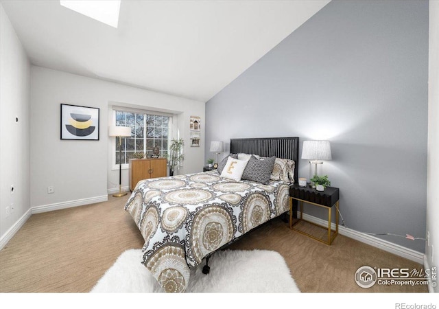 bedroom featuring lofted ceiling and carpet floors