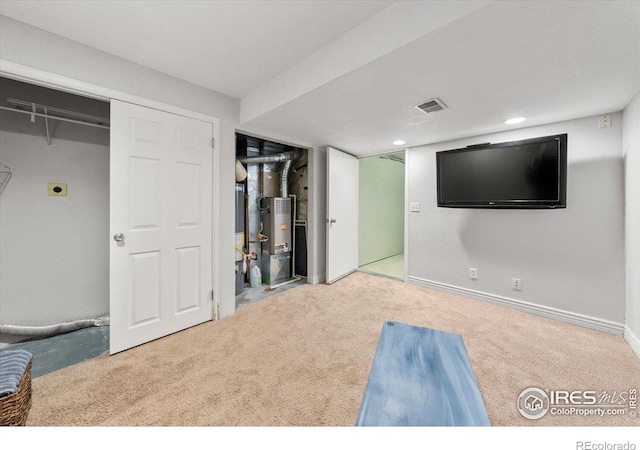 basement with light carpet