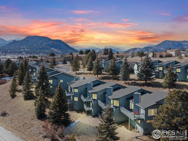 aerial view at dusk with a mountain view