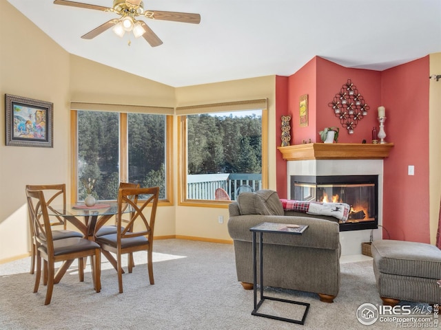 living room featuring ceiling fan and carpet floors