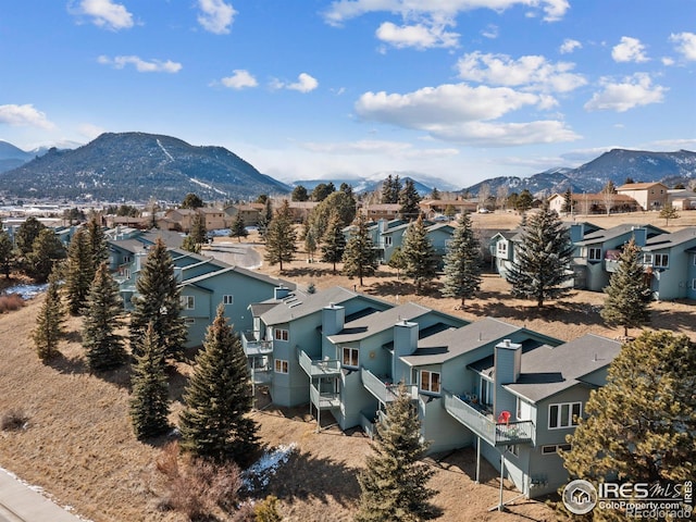 bird's eye view with a mountain view