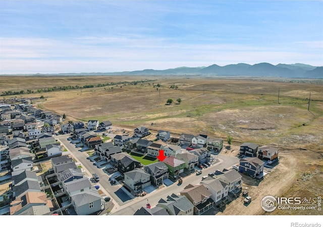 bird's eye view with a mountain view