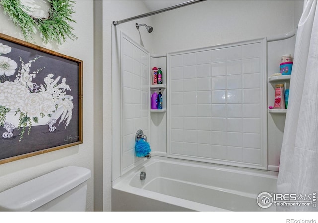 bathroom with toilet and shower / bath combo