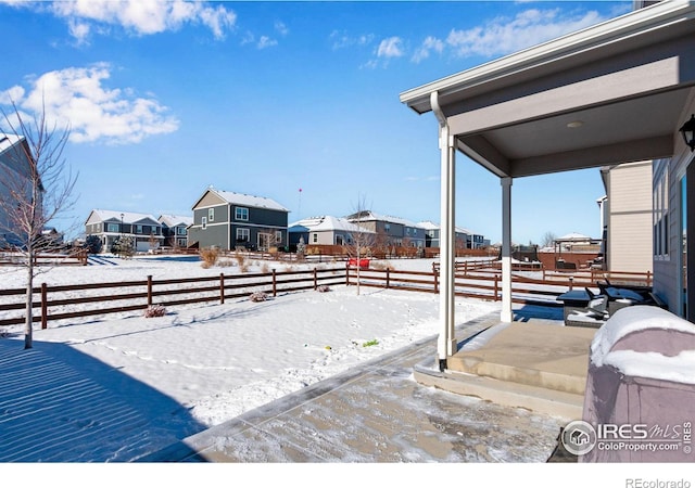 view of snow covered patio