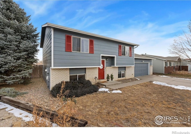 split foyer home featuring a garage