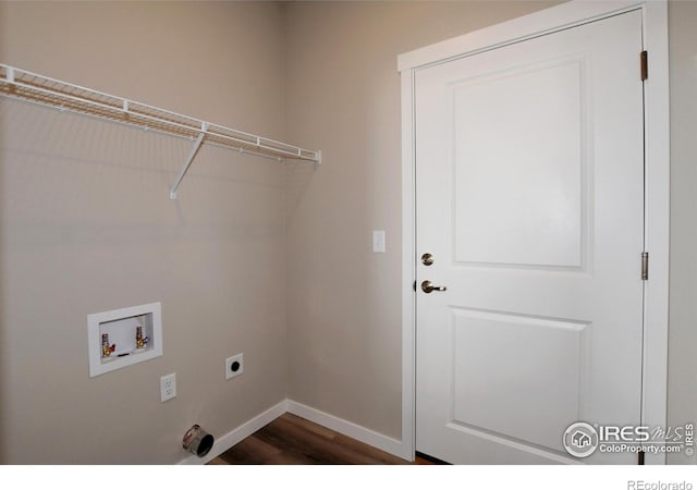 laundry area featuring hookup for an electric dryer, washer hookup, and dark hardwood / wood-style flooring