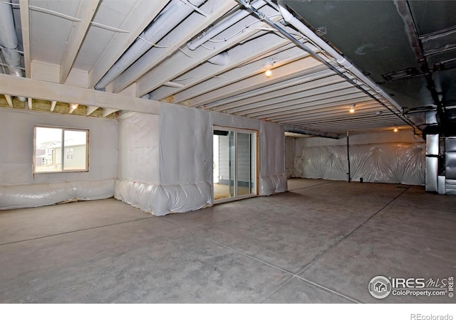 basement featuring heating unit