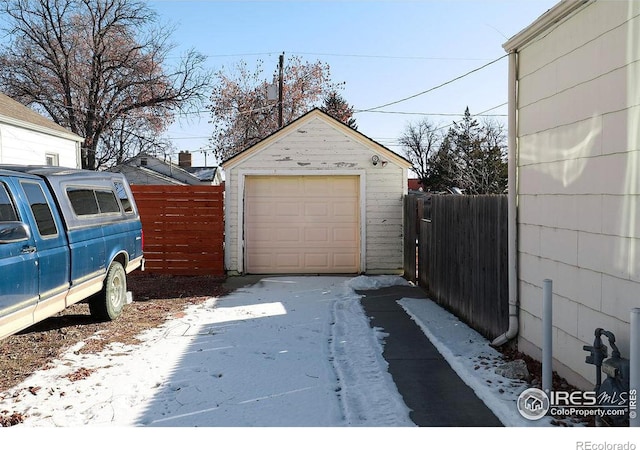 view of snow covered garage