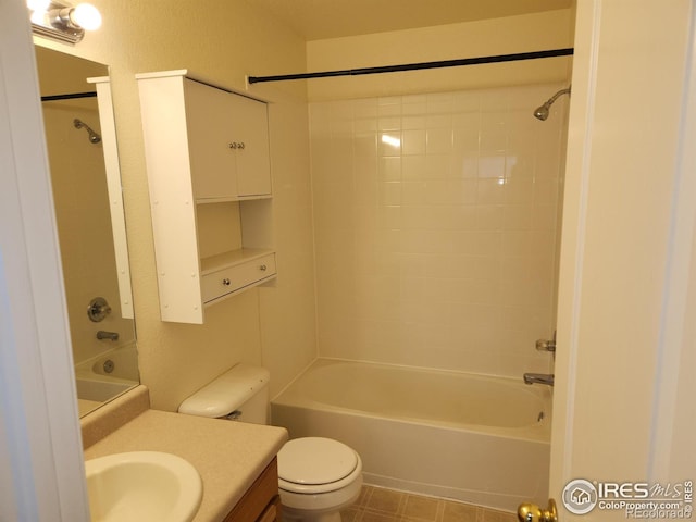 full bathroom featuring toilet, vanity, and bathing tub / shower combination