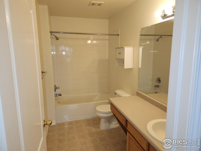 full bathroom with shower / washtub combination, vanity, and toilet