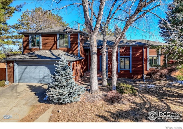 view of front of property with a garage