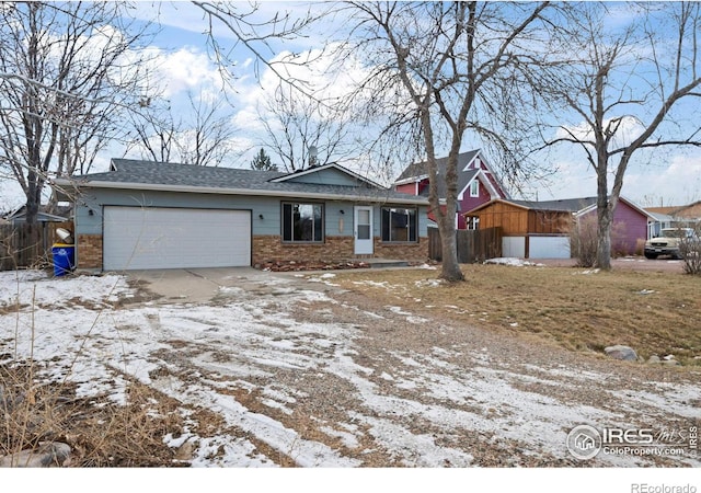 ranch-style house featuring a garage