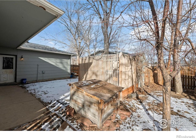 view of snow covered patio