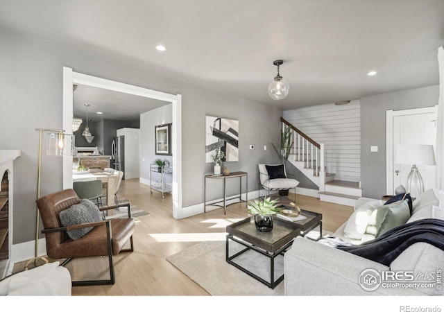 living room with light hardwood / wood-style floors