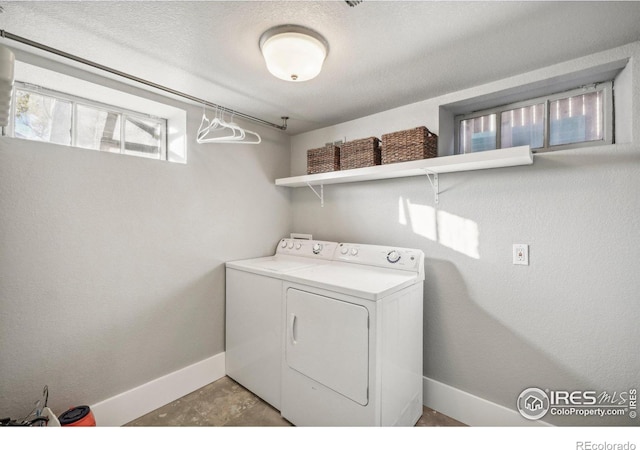 laundry area with separate washer and dryer