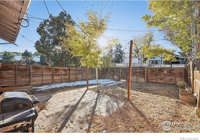 view of patio with a grill