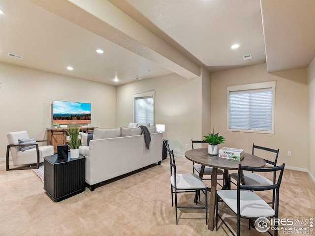 view of carpeted dining space