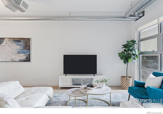 living room with hardwood / wood-style floors