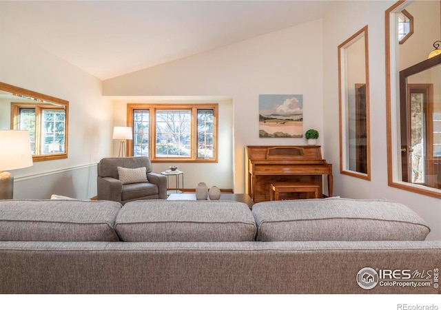 living room with vaulted ceiling