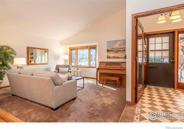 carpeted living room featuring high vaulted ceiling