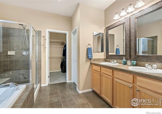 bathroom featuring vanity, separate shower and tub, and tile patterned flooring