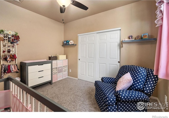 bedroom with ceiling fan, a closet, and carpet flooring