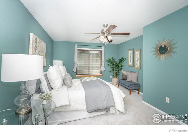 carpeted bedroom featuring ceiling fan