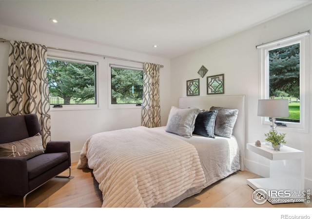 bedroom featuring light hardwood / wood-style flooring