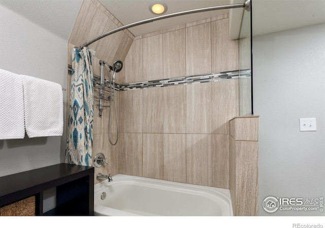 full bath with shower / bathtub combination with curtain