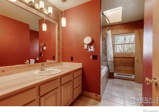 bathroom featuring shower / bathtub combination with curtain, vanity, and a baseboard radiator