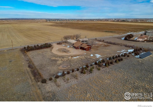 birds eye view of property featuring a rural view