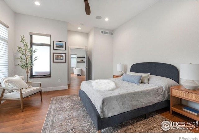 bedroom featuring ceiling fan and wood-type flooring