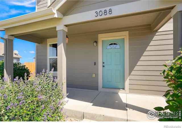 entrance to property with covered porch