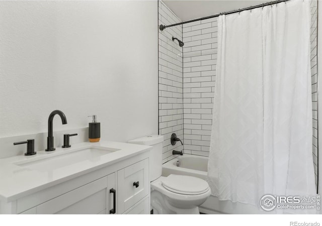 full bathroom with toilet, shower / tub combo with curtain, and vanity